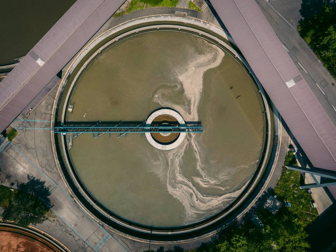 Aerial view of a circular clarifier at a water treatment plant