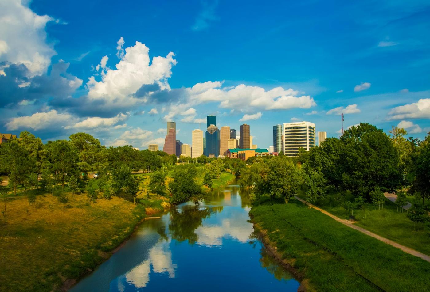 Buffalo Bayou winding toward the downtown Houston skyline